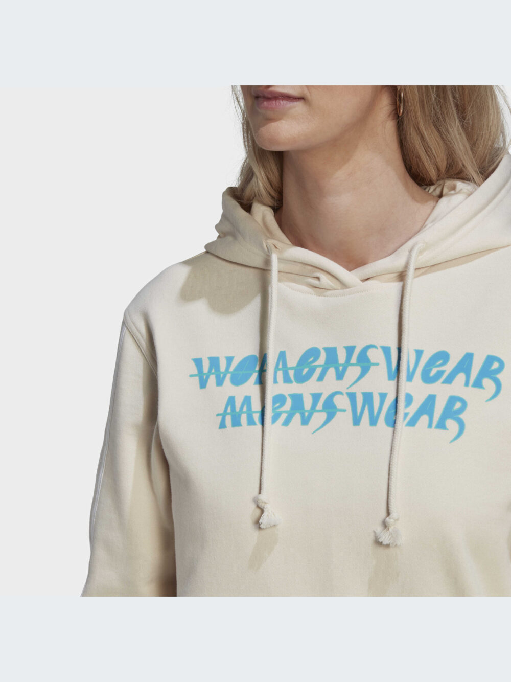 Adidas women's beige hoodie with blue graphic text and white 3-stripes sleeves.