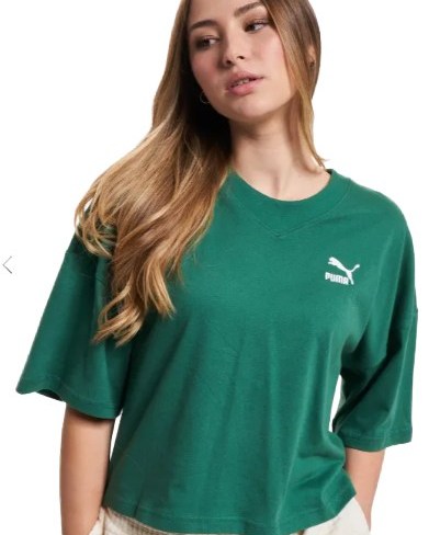 Puma Women’s Oversized Green T-Shirt with a relaxed fit, featuring the Puma logo on the chest, ideal for casual and sporty outfits.