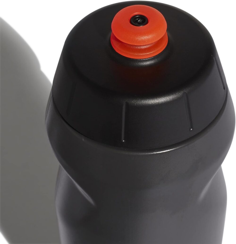 Adidas black sports water bottle with a red pop-up nozzle, featuring the Adidas logo and ergonomic design, ideal for gym or daily hydration.