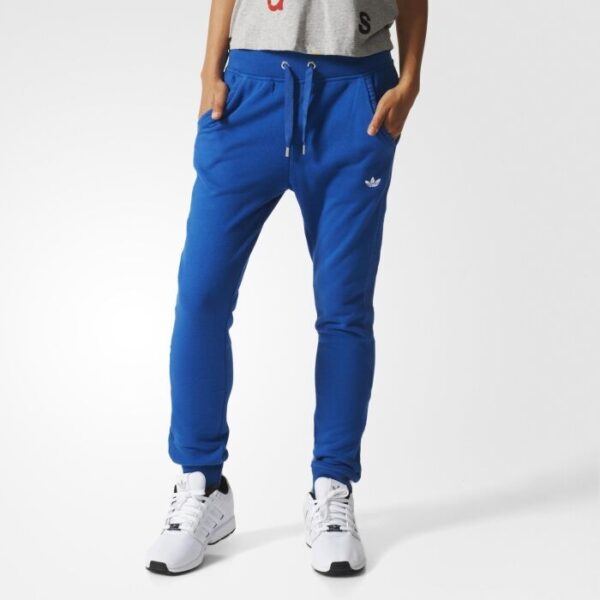 Adidas Women’s Slim-Fit Track Pants in royal blue with a drawstring waistband, tapered fit, and side pockets for casual style and comfort.