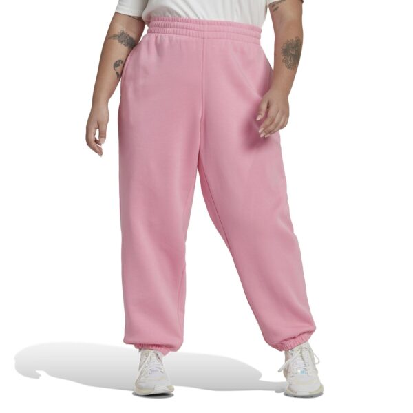 Adidas Originals Pink Sweatpants with side pockets, elastic waistband, and cuffed hems for a relaxed and comfortable fit