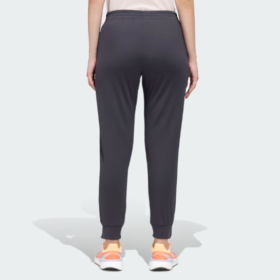 Adidas Women’s Jogger Pants in black with a tapered fit, adjustable drawstring waistband, and side pockets for casual comfort and style.