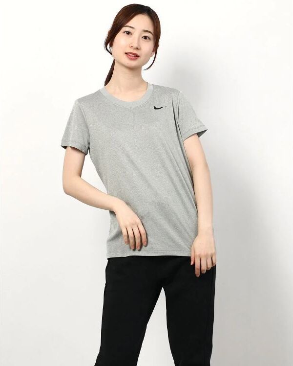 Nike Women’s Gray Essential T-Shirt with a minimalist design and Nike swoosh on the chest, perfect for casual and active wear.