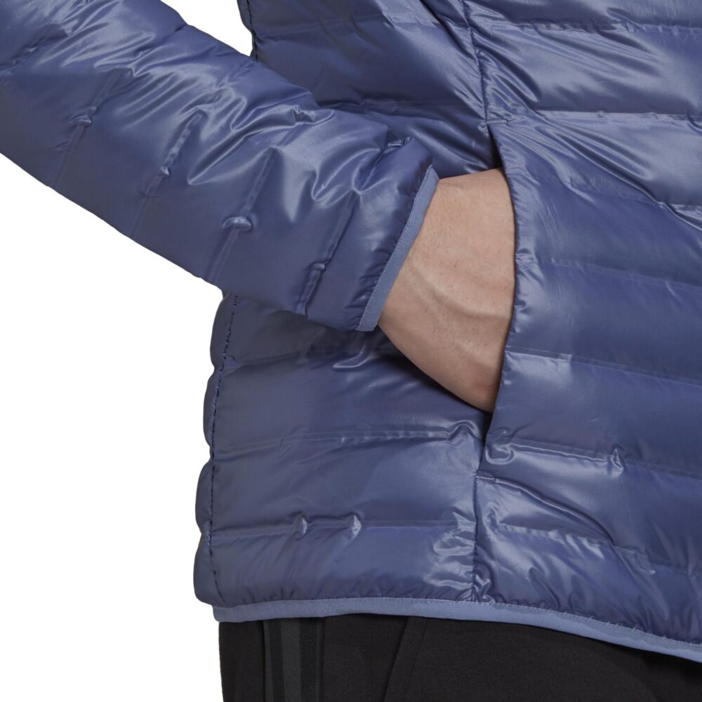 Adidas men's lightweight blue padded jacket featuring a quilted design, zip-up front, and high collar for warmth and modern style.