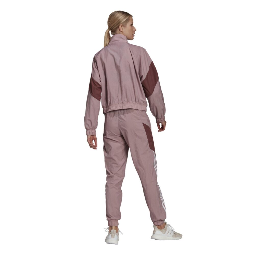 Adidas Women's Pink and Maroon Tracksuit with contrast color design, 3-stripes, and lightweight material