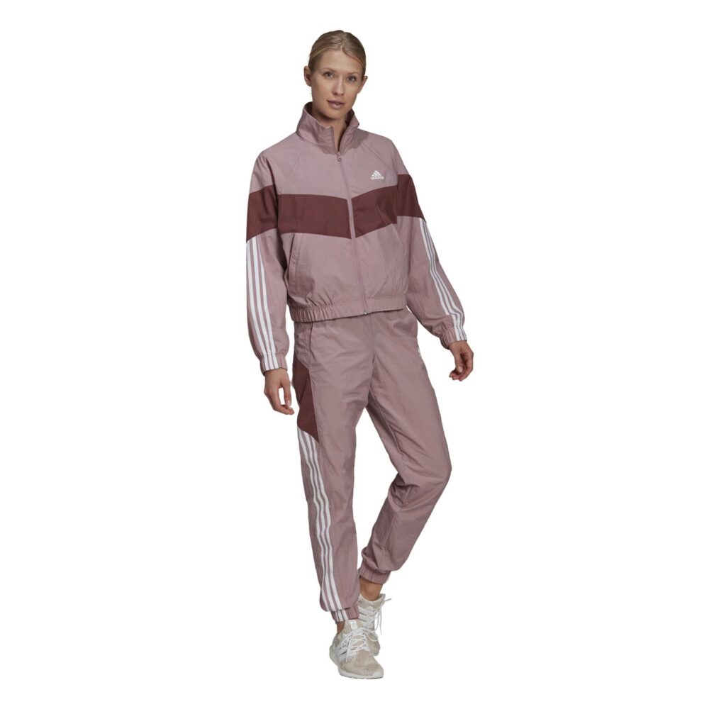 Adidas Women's Pink and Maroon Tracksuit with contrast color design, 3-stripes, and lightweight material