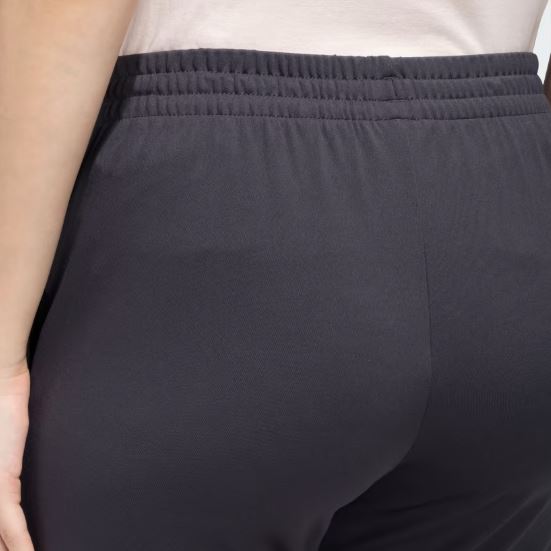 Adidas Women’s Jogger Pants in black with a tapered fit, adjustable drawstring waistband, and side pockets for casual comfort and style.