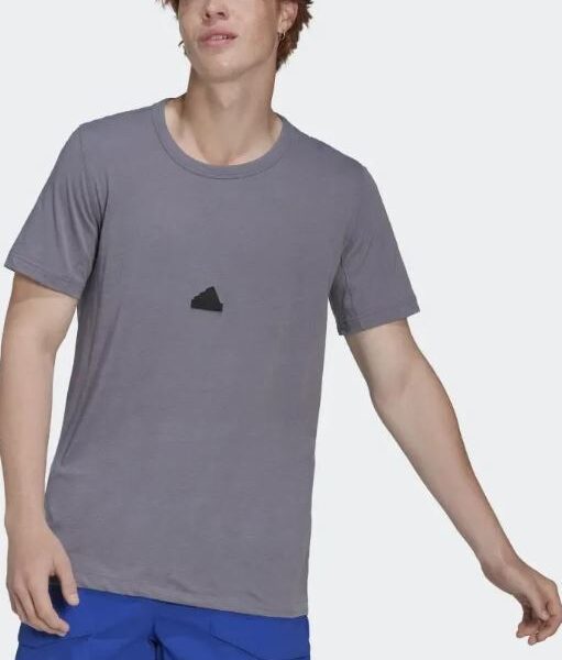 Adidas Terrex grey t-shirt featuring a minimal logo and lightweight design for outdoor activities