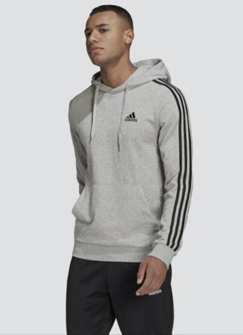 Adidas men's grey hoodie with black 3-stripes along the sleeves and an adjustable drawstring hood, ideal for casual or sporty occasions.