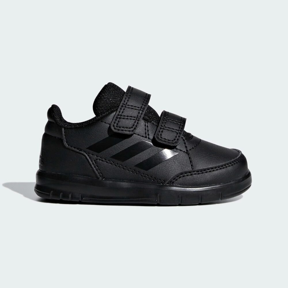 Adidas kids' black sneakers with velcro straps and sleek design.