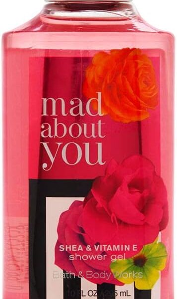 Bath & Body Works Mad About You Shower Gel in a pink bottle featuring floral accents and a striped label.