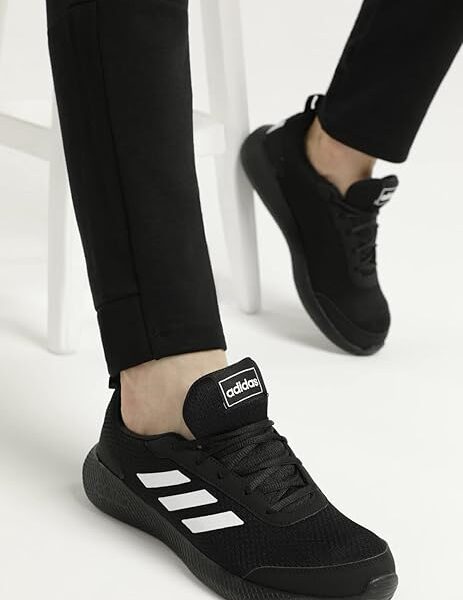 Black Adidas Galaxy 5 running shoes with white 3-Stripes.