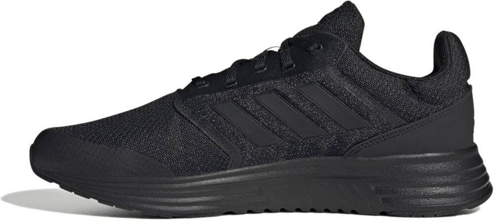 A pair of black Adidas Galaxy 5 running shoes with a breathable mesh upper and a Cloudfoam midsole.