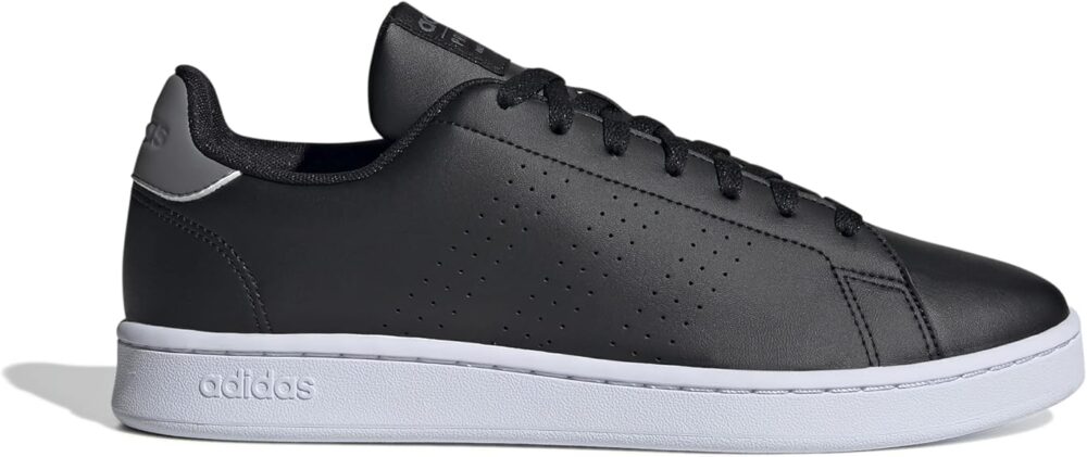 A sleek pair of Adidas black leather sneakers with a white sole, designed for casual and sporty looks.