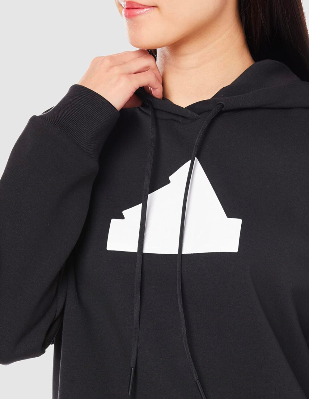 A black adidas hoodie with a white Trefoil logo on the chest.