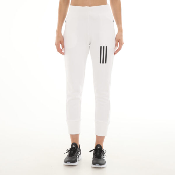 White Adidas women's high-waisted jogger pants with 3-stripe logo, designed with tapered cuffs and an elastic waistband for a sleek, comfortable fit.