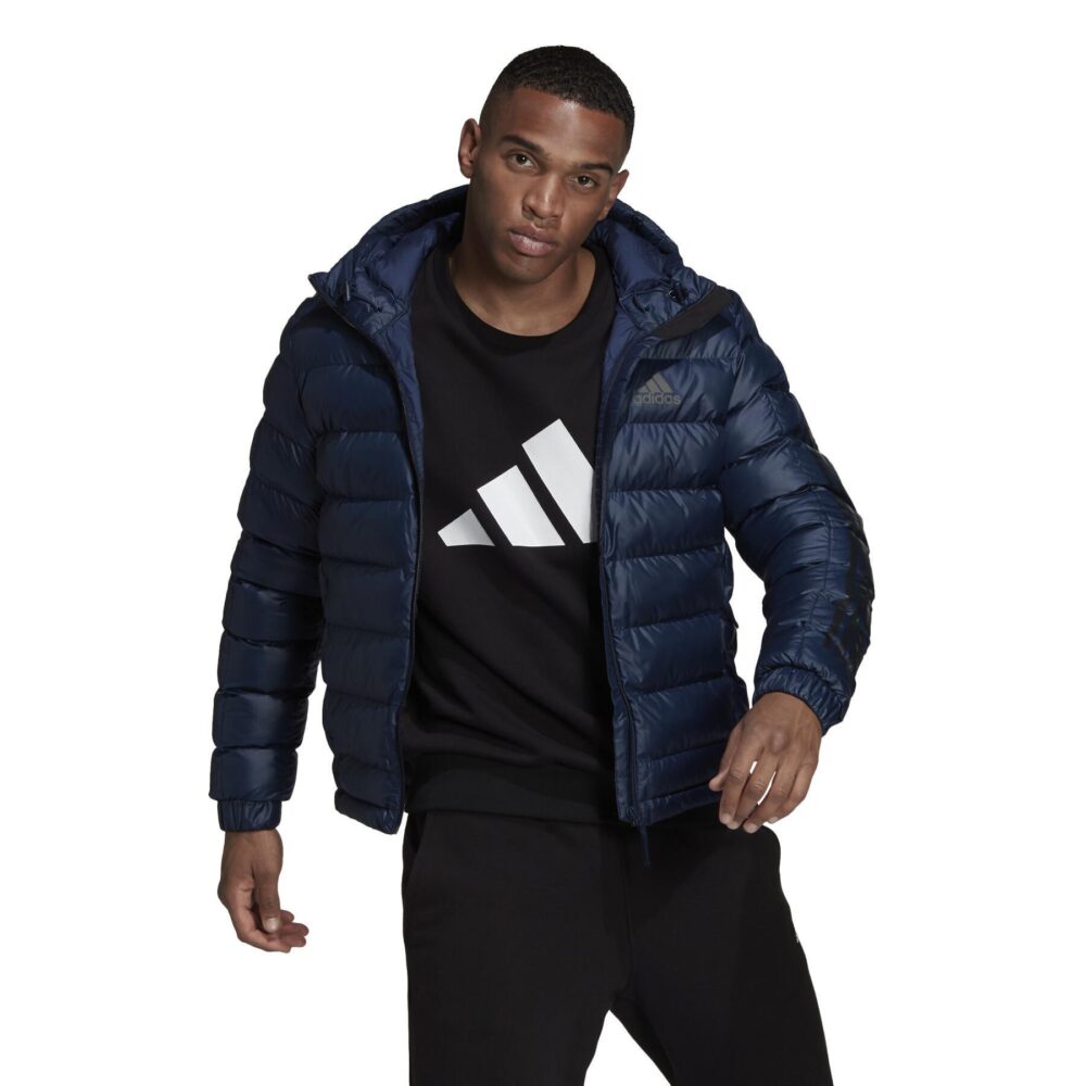 Navy blue Adidas puffer jacket with hood, quilted pattern, and full zipper.