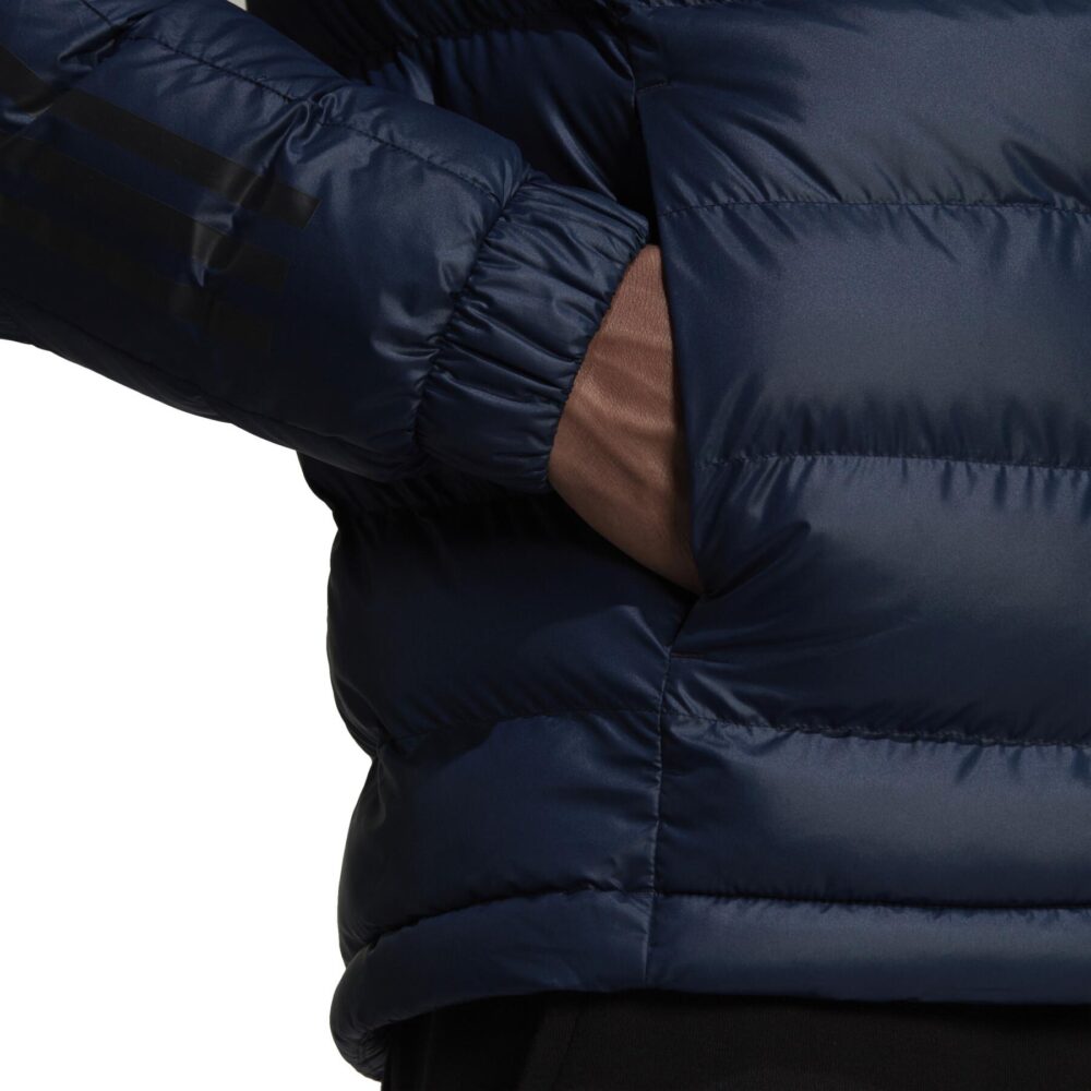 Navy blue Adidas puffer jacket with hood, quilted pattern, and full zipper.