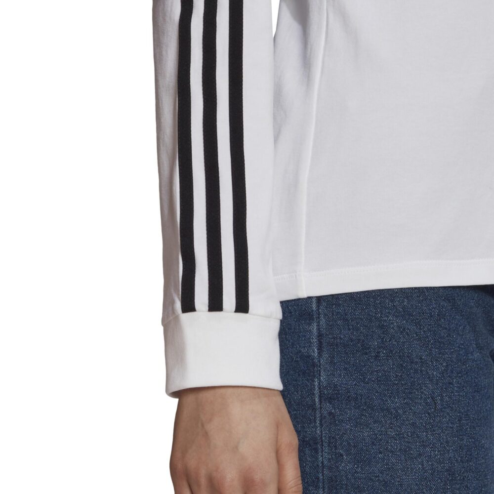 Adidas Originals women's white long sleeve T-shirt with 3-stripes design on the sleeves and Trefoil logo on the chest.