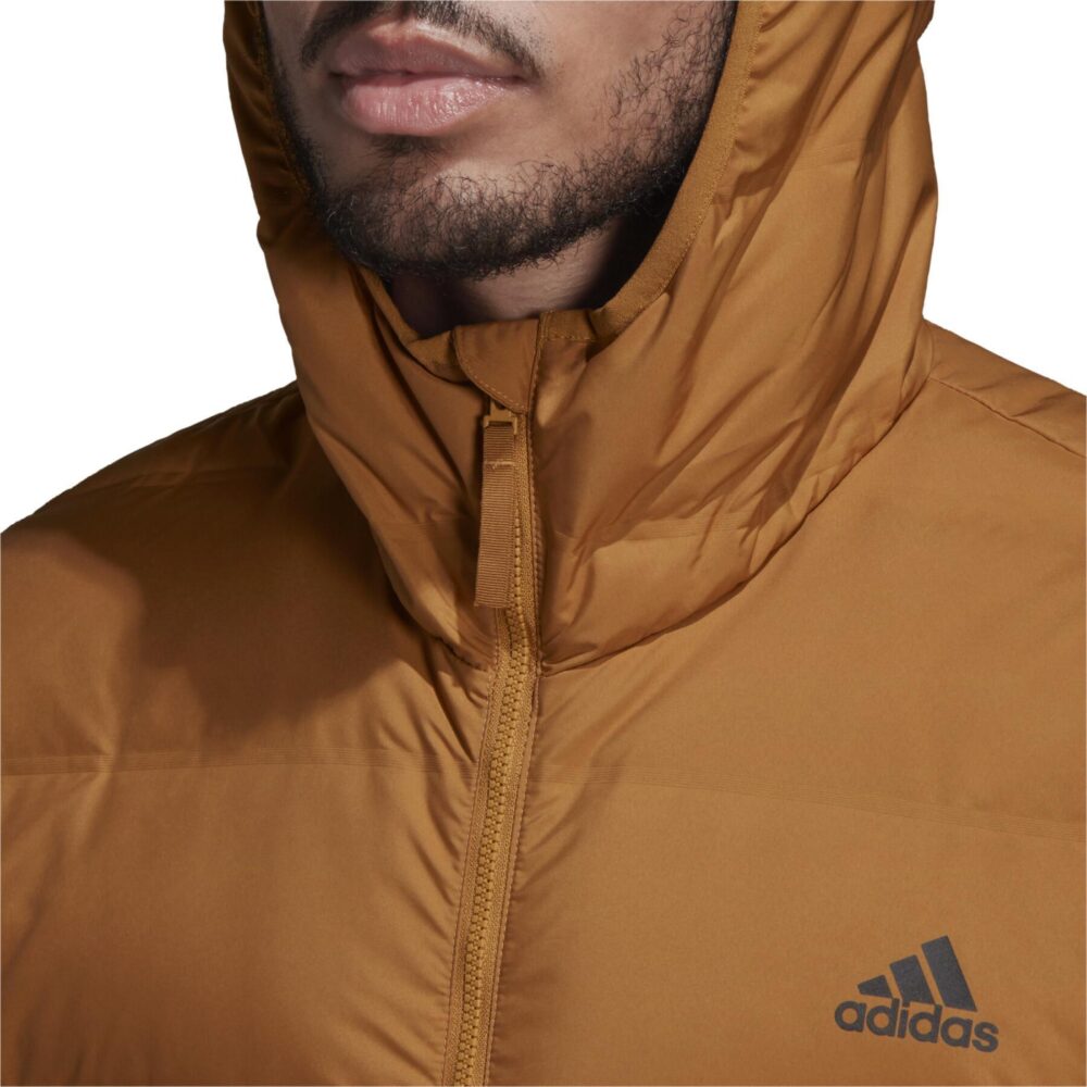 A tan Adidas Essentials Light Down Jacket with a hood and zippered pockets.