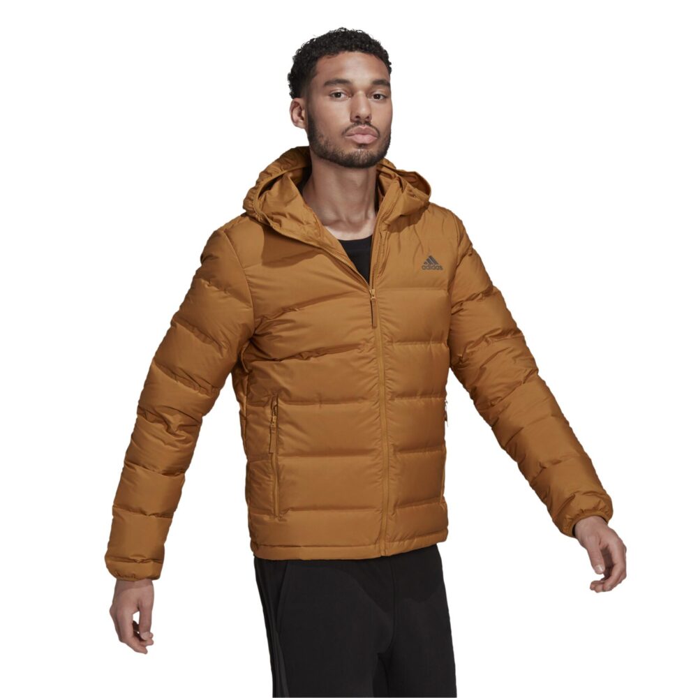 A tan Adidas Essentials Light Down Jacket with a hood and zippered pockets.