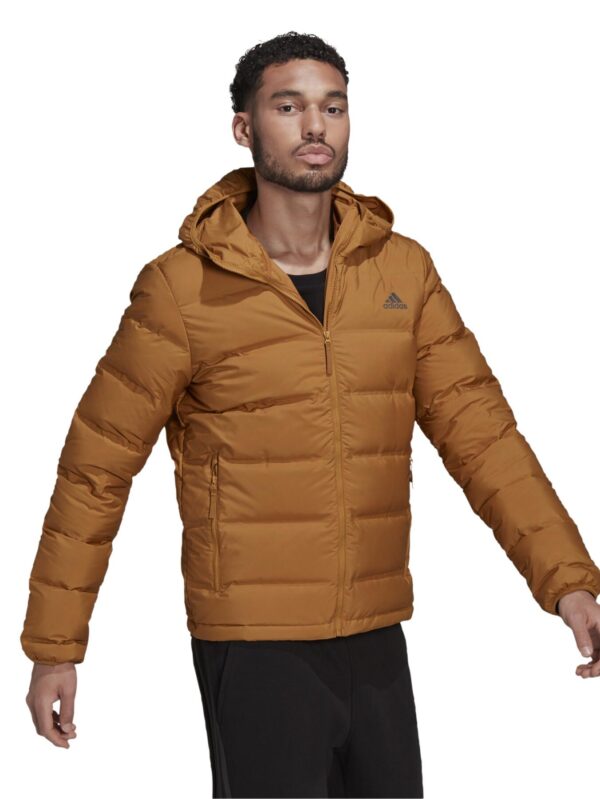 A tan Adidas Essentials Light Down Jacket with a hood and zippered pockets.