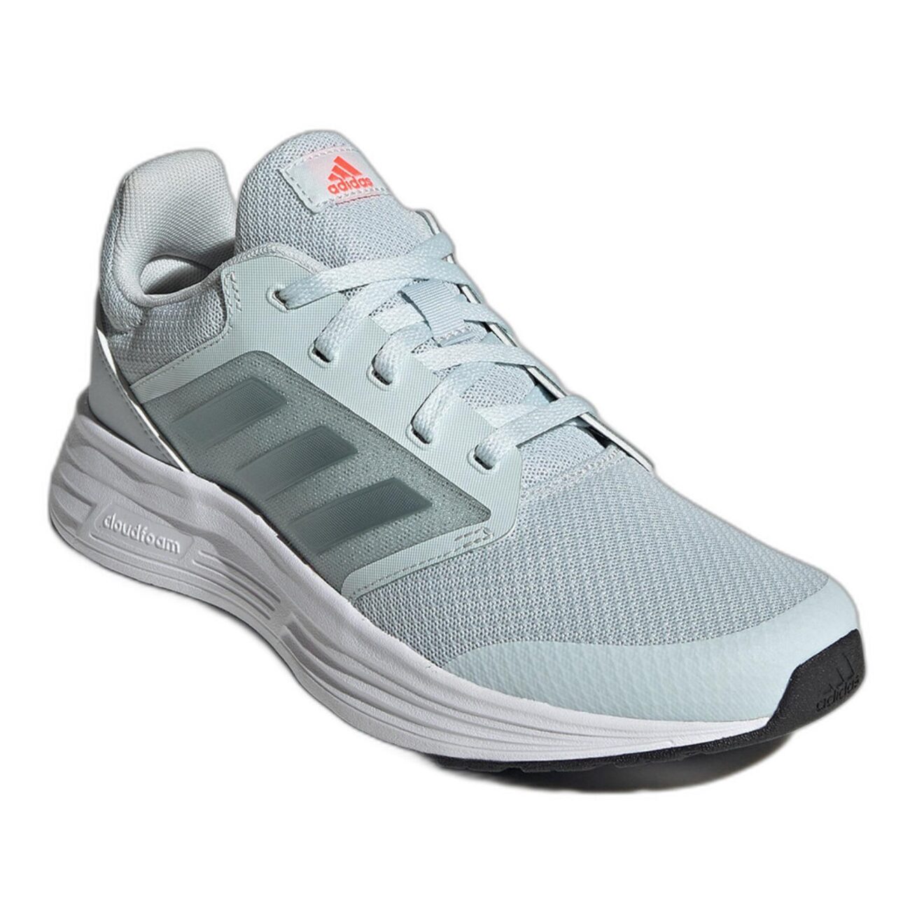 Adidas women's running shoes in pastel blue with a breathable mesh upper and cushioned sole.