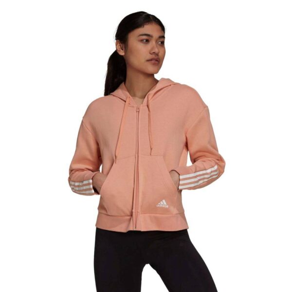 A pink Adidas Essentials 3-Stripes Full-Zip Hoodie with white 3-Stripes on the sleeves and a small Adidas logo on the left chest.