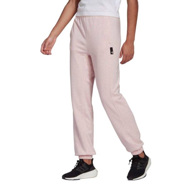 A pair of pink Adidas Studio Lounge Summer Pants for women, featuring a high waist and a relaxed fit.