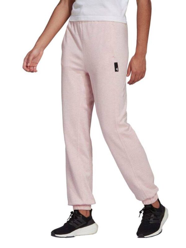 A pair of pink Adidas Studio Lounge Summer Pants for women, featuring a high waist and a relaxed fit.