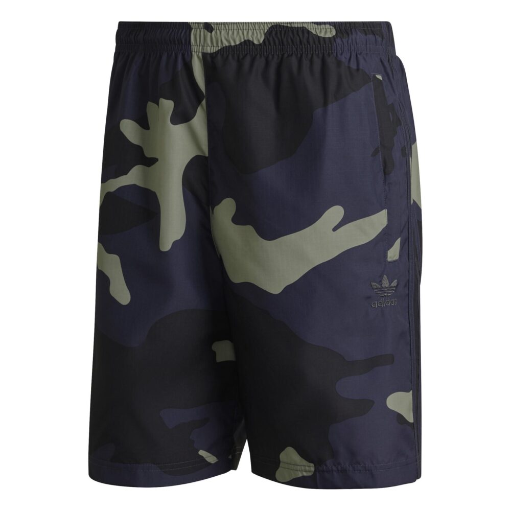 Adidas Men's Camo Print Shorts with an elastic waistband and side pockets, paired with white Adidas sneakers.