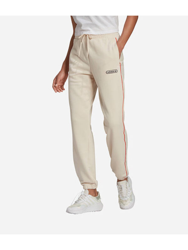 Cream-colored Adidas Adicolor Classics Trefoil Track Pants with red piping and the Trefoil logo.