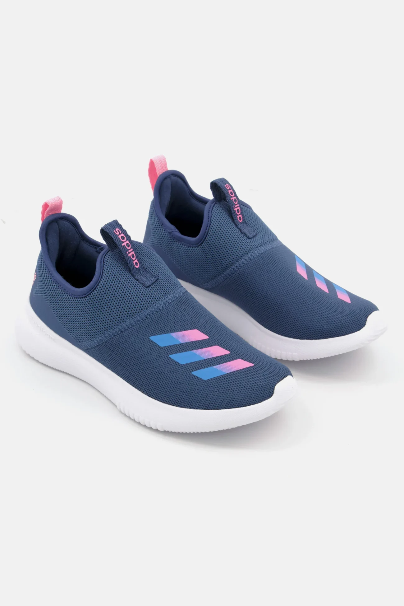 A pair of Adidas Swift Run X Slip-On Shoes in a blue color with pink accents and the Adidas logo.