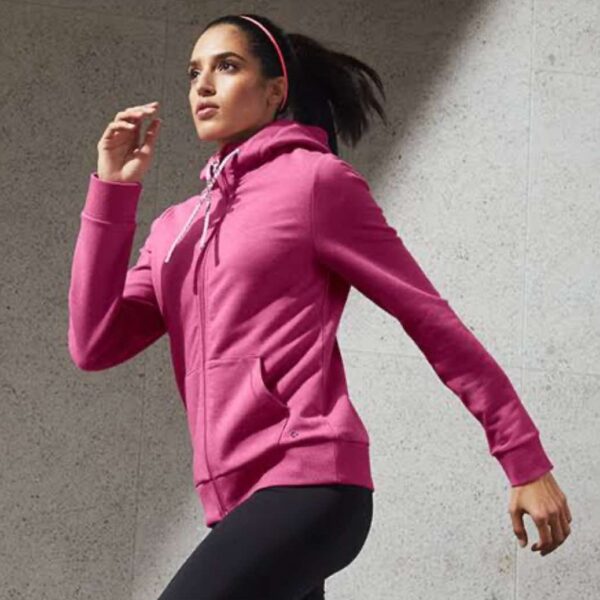 Pink hooded sweatshirt with a full-zip closure and kangaroo pockets.