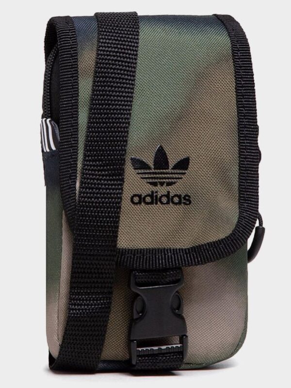 A green and brown camo-printed Adidas shoulder bag with a black adjustable strap and multiple compartments.