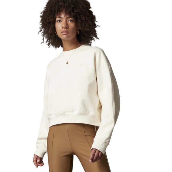 eaturing a relaxed fit and a distinctive batwing sleeve design.