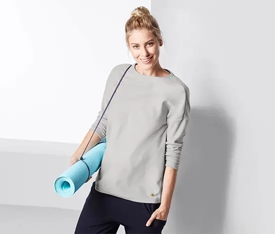 A light grey long-sleeved tunic with a crew neck
