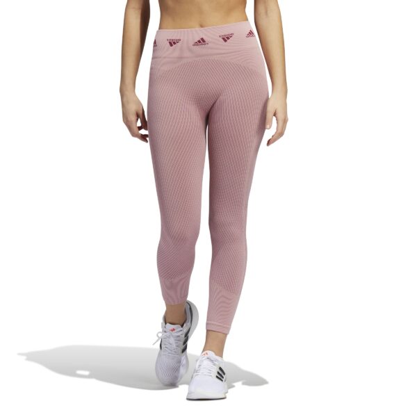 Adidas Women's Aeroknit Training 7/8 Leggings, mauve seamless fabric, high-rise waistband with repeating Adidas logo, 7/8 length.