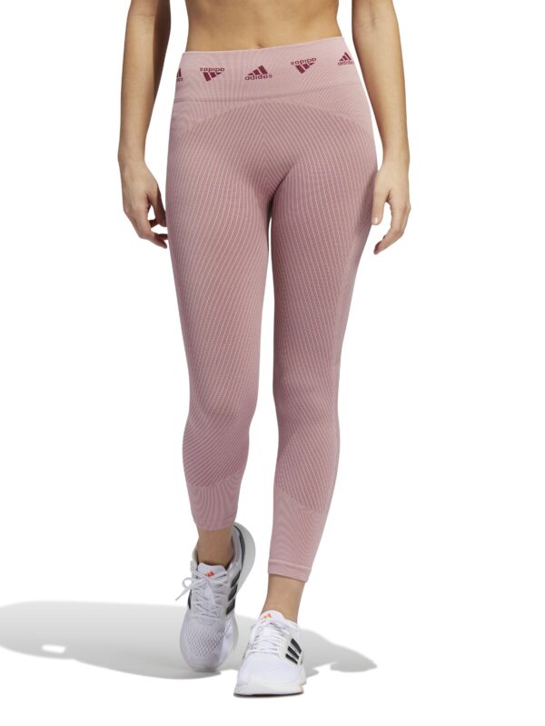 Adidas Women's Aeroknit Training 7/8 Leggings, mauve seamless fabric, high-rise waistband with repeating Adidas logo, 7/8 length.