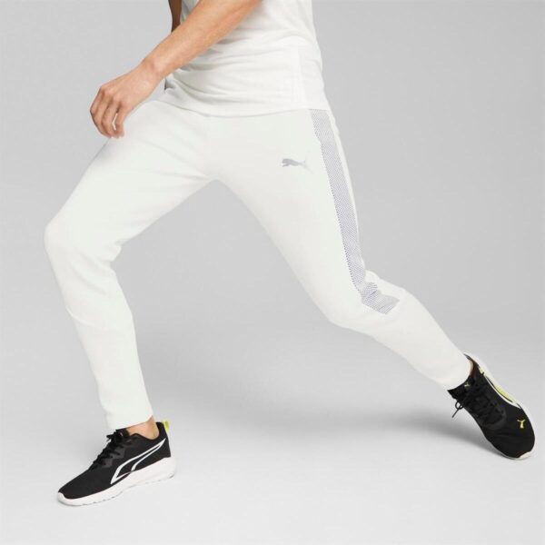 Puma Evostripe Men's Pants in white with textured side panels and Puma logo.