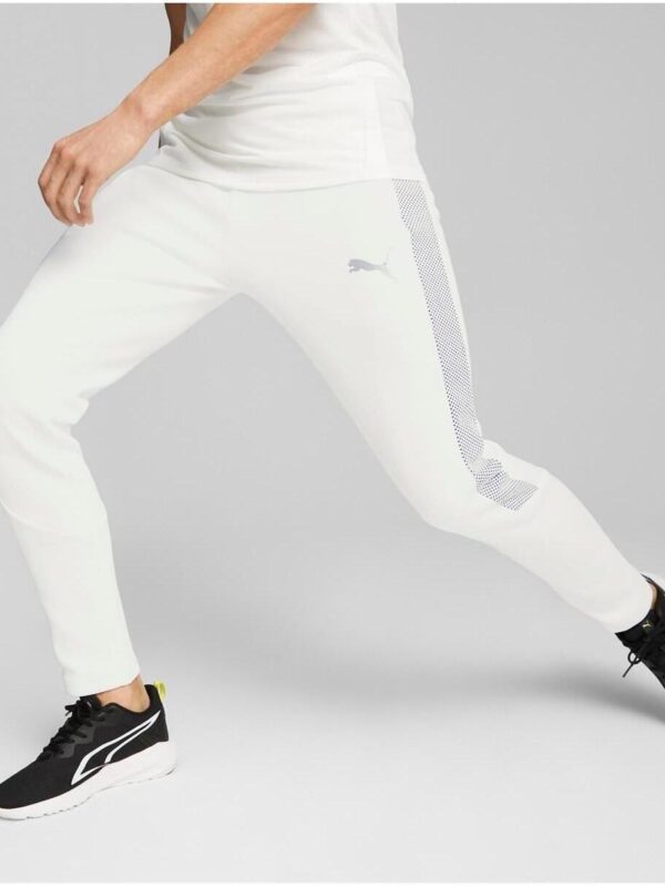 Puma Evostripe Men's Pants in white with textured side panels and Puma logo.